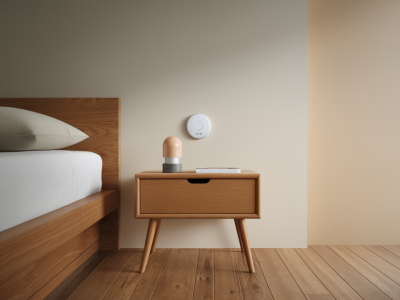 Which tiny smart smoke detector will actually wake a sleeping adult and save space on a minimalist bedside setup
